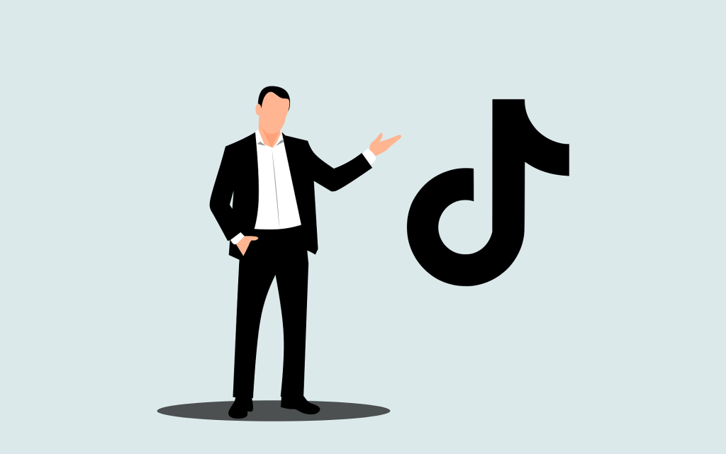 TikTokのロゴと男性
